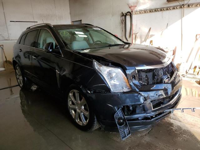 CADILLAC SRX PERFOR 2013 with VIN 3GYFNHE37DS633553 - Photo from auction
