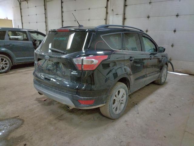 Photo 4 from auction – 2017 FORD ESCAPE SE with VIN 1FMCU9GD8HUD58350
