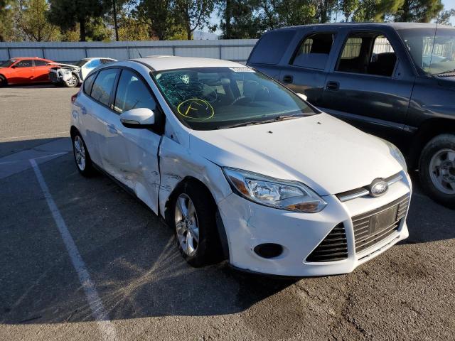 FORD FOCUS SE 2014 with VIN 1FADP3K27EL170106 - Photo from auction