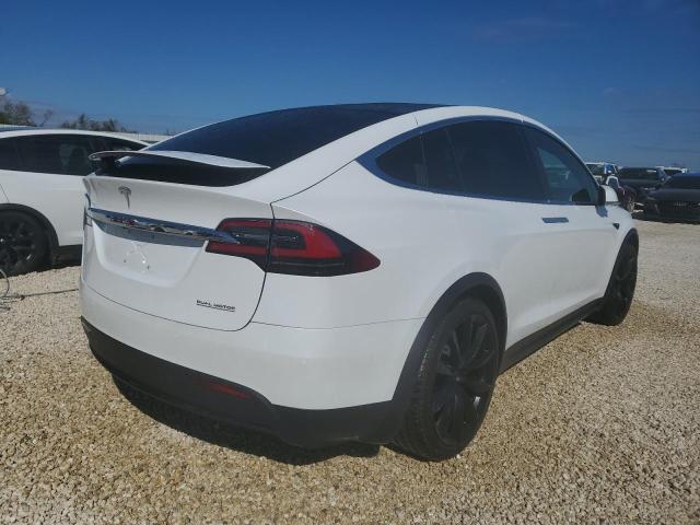 Photo 4 from auction – 2021 TESLA MODEL X with VIN 5YJXCAE44MF323420
