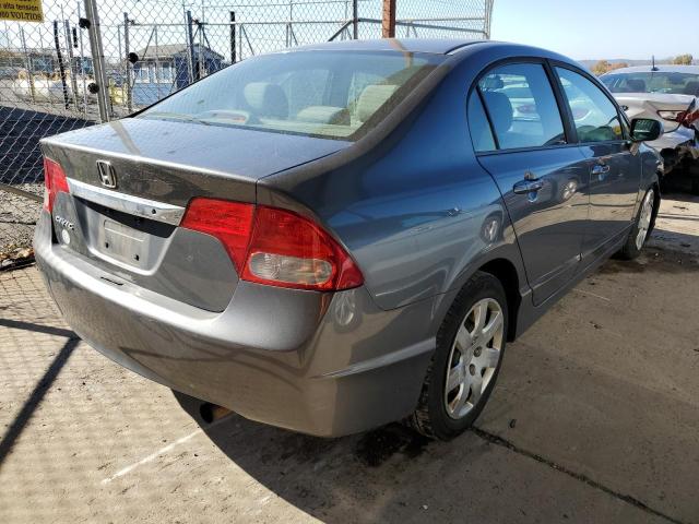 Photo 4 from auction – 2011 HONDA CIVIC LX with VIN 19XFA1F57BE026265