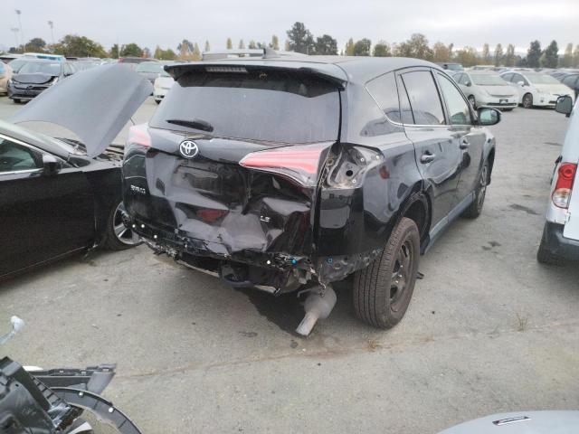 Photo 4 from auction – 2018 TOYOTA RAV4 LE with VIN 2T3ZFREV6JW422687
