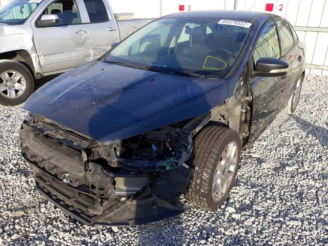 Photo 2 from auction – 2015 FORD FOCUS SE with VIN 1FADP3F27FL209935