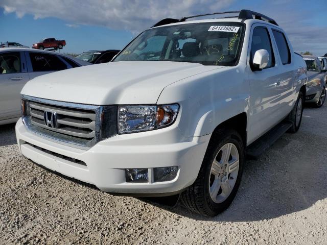 Photo 2 from auction – 2014 HONDA RIDGELINE with VIN 5FPYK1F55EB013879
