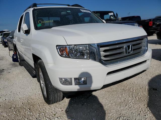 HONDA RIDGELINE 2014 with VIN 5FPYK1F55EB013879 - Photo from auction