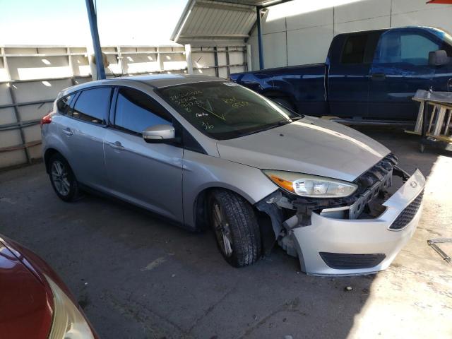FORD FOCUS SE 2015 with VIN 1FADP3K23FL307401 - Photo from auction