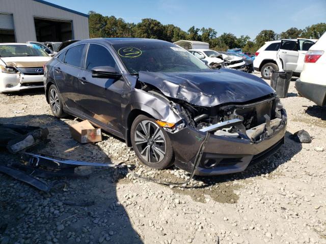 HONDA CIVIC EX 2018 with VIN JHMFC1F36JX043953 - Photo from auction