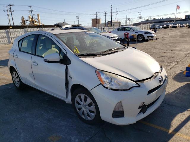 TOYOTA PRIUS C 2014 with VIN JTDKDTB39E1574037 - Photo from auction