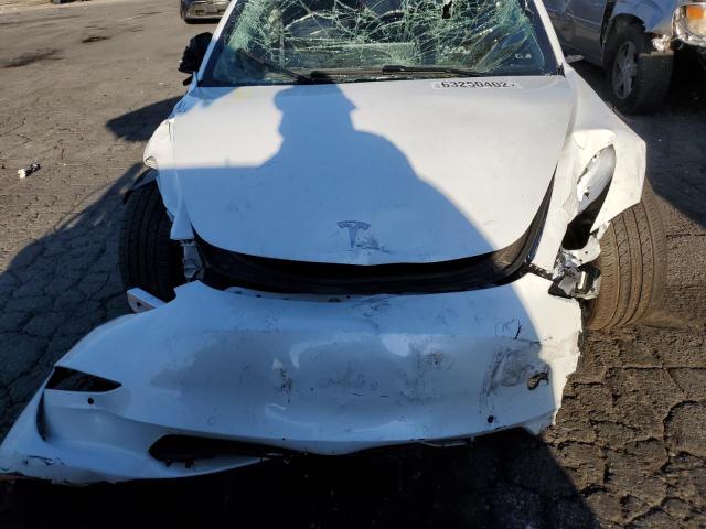 Photo 9 from auction – 2022 TESLA MODEL 3 with VIN 5YJ3E1EB0NF135468