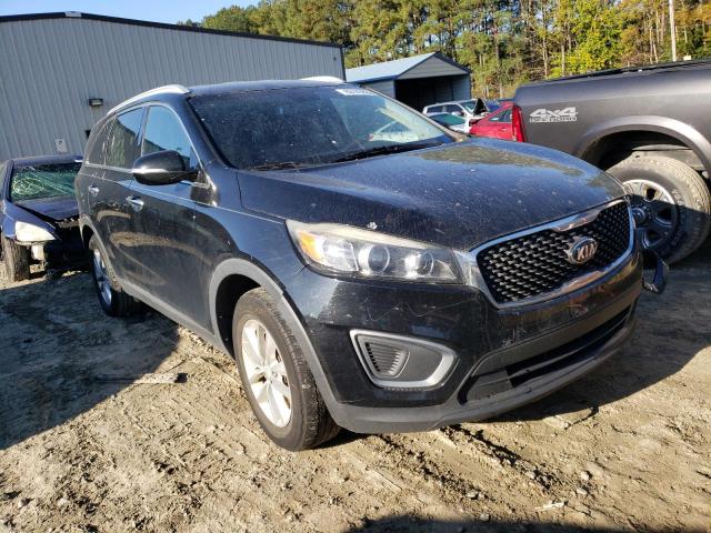KIA SORENTO LX 2016 with VIN 5XYPG4A37GG082369 - Photo from auction