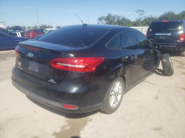 Photo 4 from auction – 2016 FORD FOCUS SE with VIN 1FADP3F29GL397391