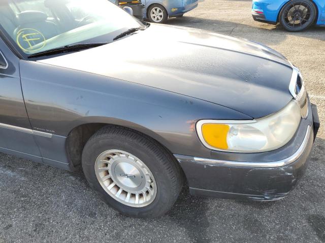 Photo 9 from auction – 1999 LINCOLN TOWN CAR E with VIN 1LNHM81W5XY708065