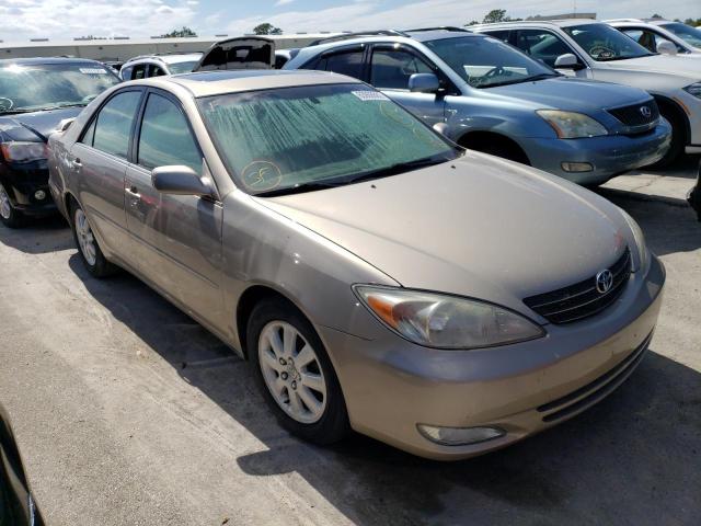 TOYOTA CAMRY LE 2003 with VIN 4T1BE30KX3U230358 - Photo from auction