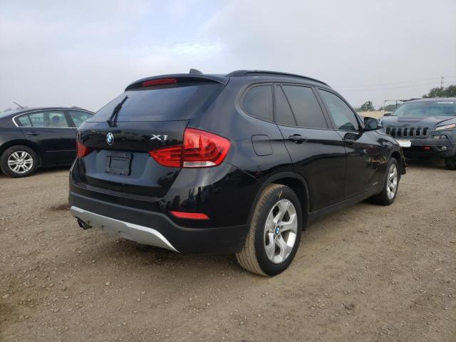 Photo 4 from auction – 2013 BMW X1 SDRIVE2 with VIN WBAVM1C53DVW42631