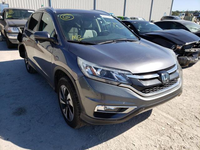 Photo 1 from auction – 2015 HONDA CR-V TOURI with VIN 5J6RM3H95FL024778