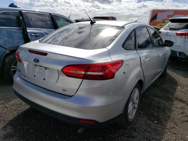 Photo 4 from auction – 2017 FORD FOCUS SE with VIN 1FADP3F24HL242247