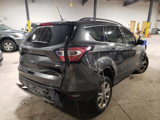 Photo 4 from auction – 2017 FORD ESCAPE SE with VIN 1FMCU9GD8HUC88705