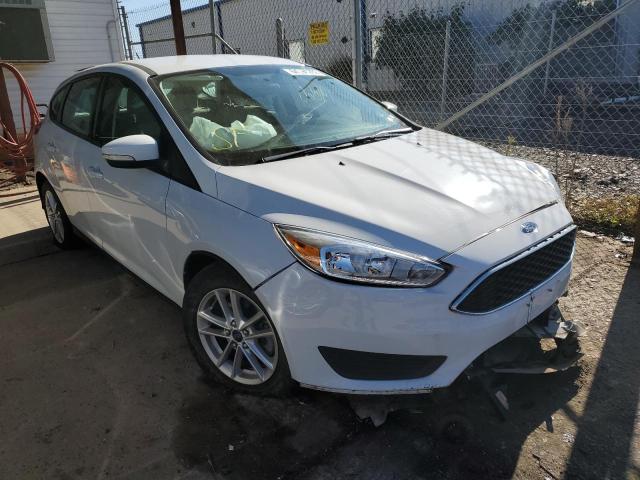 FORD FOCUS SE 2015 with VIN 1FADP3K23FL382258 - Photo from auction