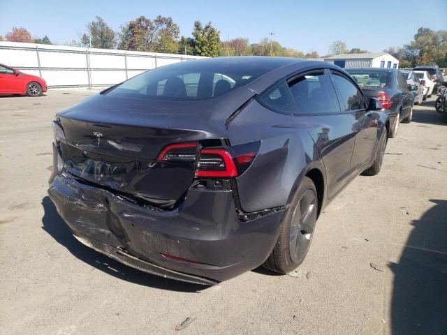 Photo 4 from auction – 2022 TESLA MODEL 3 with VIN 5YJ3E1EA2NF230668
