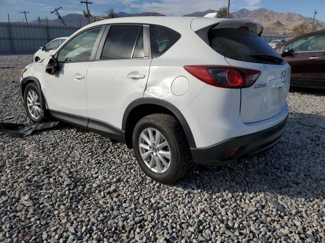 Photo 3 from auction – 2014 MAZDA CX-5 TOURI with VIN JM3KE2CY0E0383413