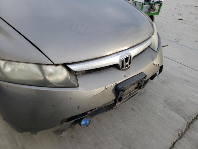 Photo 9 from auction – 2006 HONDA CIVIC HYBR with VIN JHMFA36236S013791