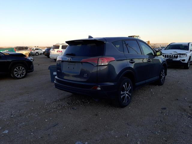 Photo 4 from auction – 2018 TOYOTA RAV4 LE with VIN JTMBFREV9JJ216487