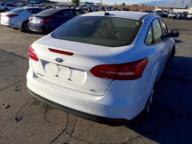Photo 4 from auction – 2015 FORD FOCUS SE with VIN 1FADP3F21FL203936