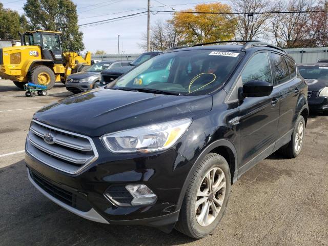 Photo 2 from auction – 2018 FORD ESCAPE SE with VIN 1FMCU9GD6JUC57362