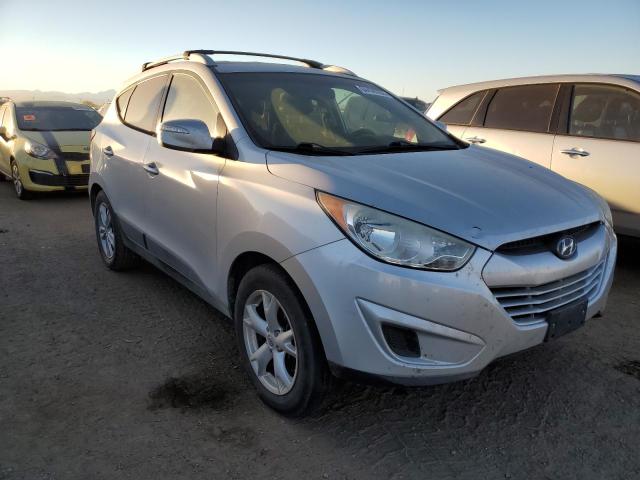 HYUNDAI TUCSON GLS 2012 with VIN KM8JUCAC1CU451210 - Photo from auction