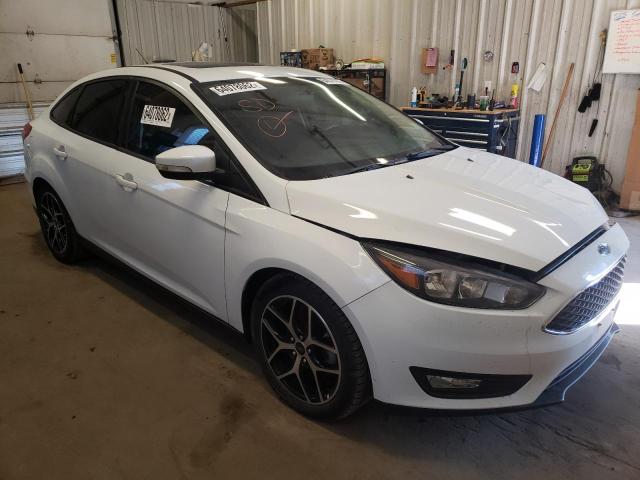 FORD FOCUS SEL 2017 with VIN 1FADP3H22HL332557 - Photo from auction