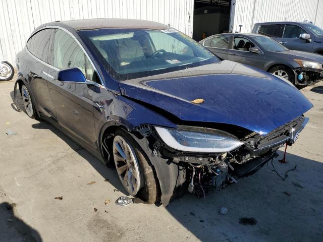 TESLA MODEL X 2018 with VIN 5YJXCBE2XJF138708 - Photo from auction