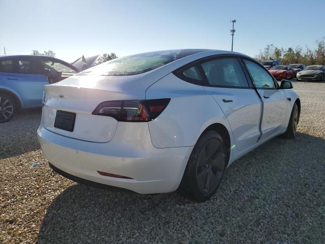 Photo 4 from auction – 2021 TESLA MODEL 3 with VIN 5YJ3E1EAXMF098368