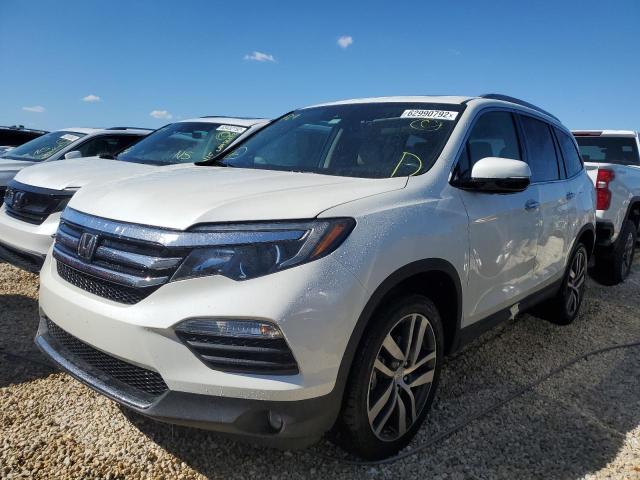 Photo 2 from auction – 2017 HONDA PILOT TOUR with VIN 5FNYF5H95HB039486