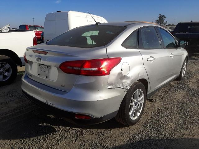 Photo 4 from auction – 2017 FORD FOCUS SE with VIN 1FADP3F28HL308895