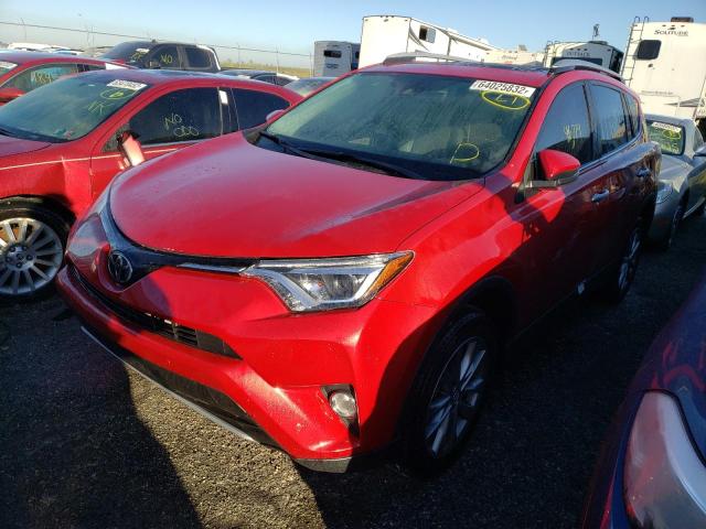 Photo 2 from auction – 2016 TOYOTA RAV4 LIMIT with VIN 2T3YFREV8GW306802