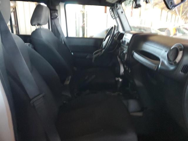 Photo 5 from auction – 2016 JEEP WRANGLER U with VIN 1C4BJWDG7GL227811