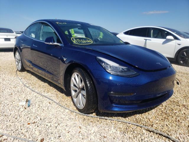 TESLA MODEL 3 2018 with VIN 5YJ3E1EB8JF097742 - Photo from auction
