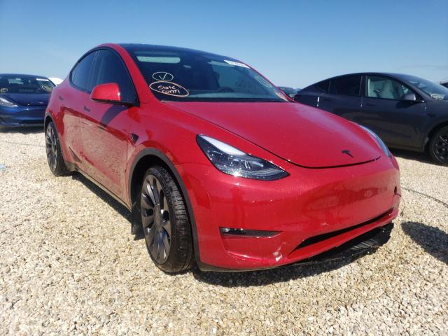 TESLA MODEL Y 2022 with VIN 7SAYGDEF4NF377669 - Photo from auction
