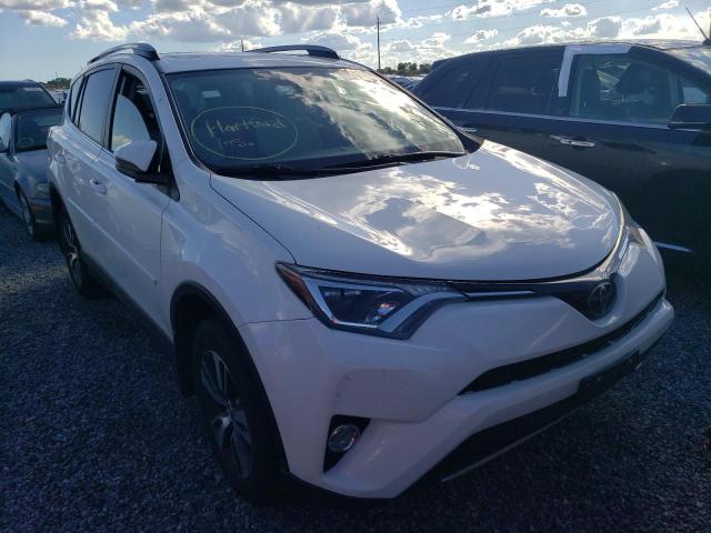 TOYOTA RAV4 XLE 2017 with VIN JTMRFREV9HJ710972 - Photo from auction