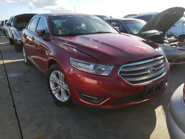 FORD TAURUS SEL 2015 with VIN 1FAHP2E8XFG127403 - Photo from auction
