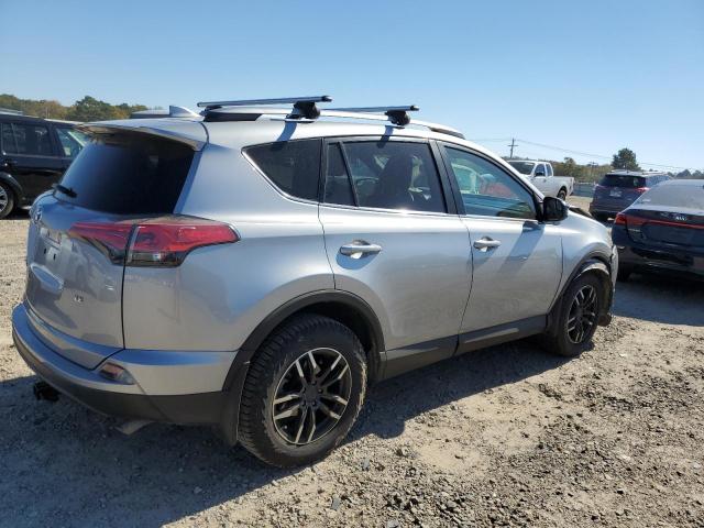 Photo 4 from auction – 2018 TOYOTA RAV4 LE with VIN 2T3ZFREV6JW512941