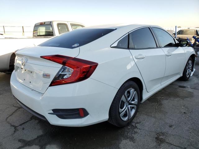 Photo 4 from auction – 2018 HONDA CIVIC LX with VIN 19XFC2F57JE004541