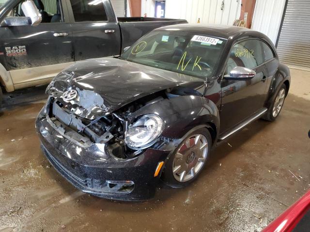 Photo 2 from auction – 2013 VOLKSWAGEN BEETLE with VIN 3VWJP7AT2DM647789