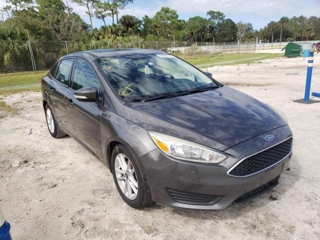 FORD FOCUS SE 2015 with VIN 1FADP3F27FL235497 - Photo from auction