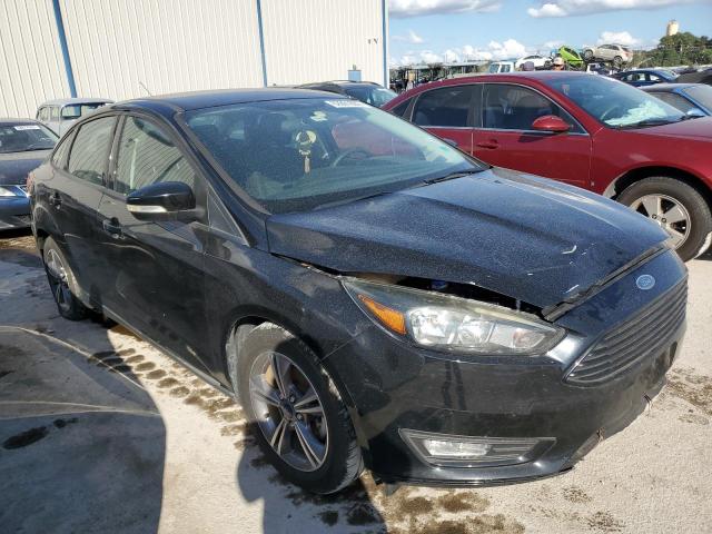 FORD FOCUS SE 2017 with VIN 1FADP3FE9HL275044 - Photo from auction