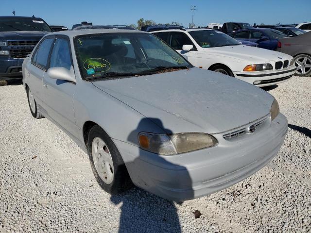 TOYOTA COROLLA VE 2000 with VIN 2T1BR12E6YC334001 - Photo from auction