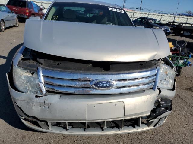 Photo 9 from auction – 2009 FORD TAURUS SE with VIN 1FAHP23W29G113582