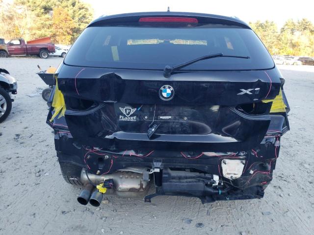 Photo 9 from auction – 2014 BMW X1 XDRIVE2 with VIN WBAVL1C5XEVY22385