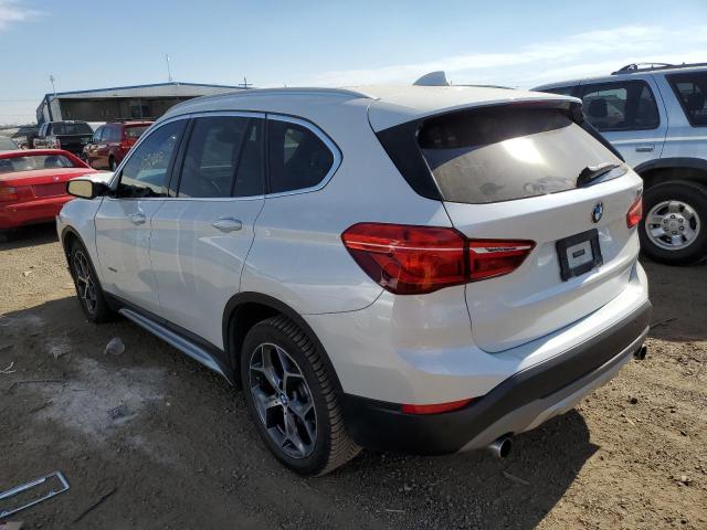 Photo 3 from auction – 2016 BMW X1 XDRIVE2 with VIN WBXHT3C39G5E50556