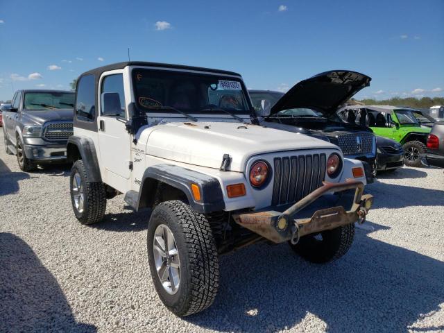 JEEP WRANGLER / 2000 with VIN 1J4FA49S1YP710203 - Photo from auction